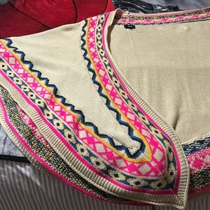 It’s a woman’s shawl nice colors